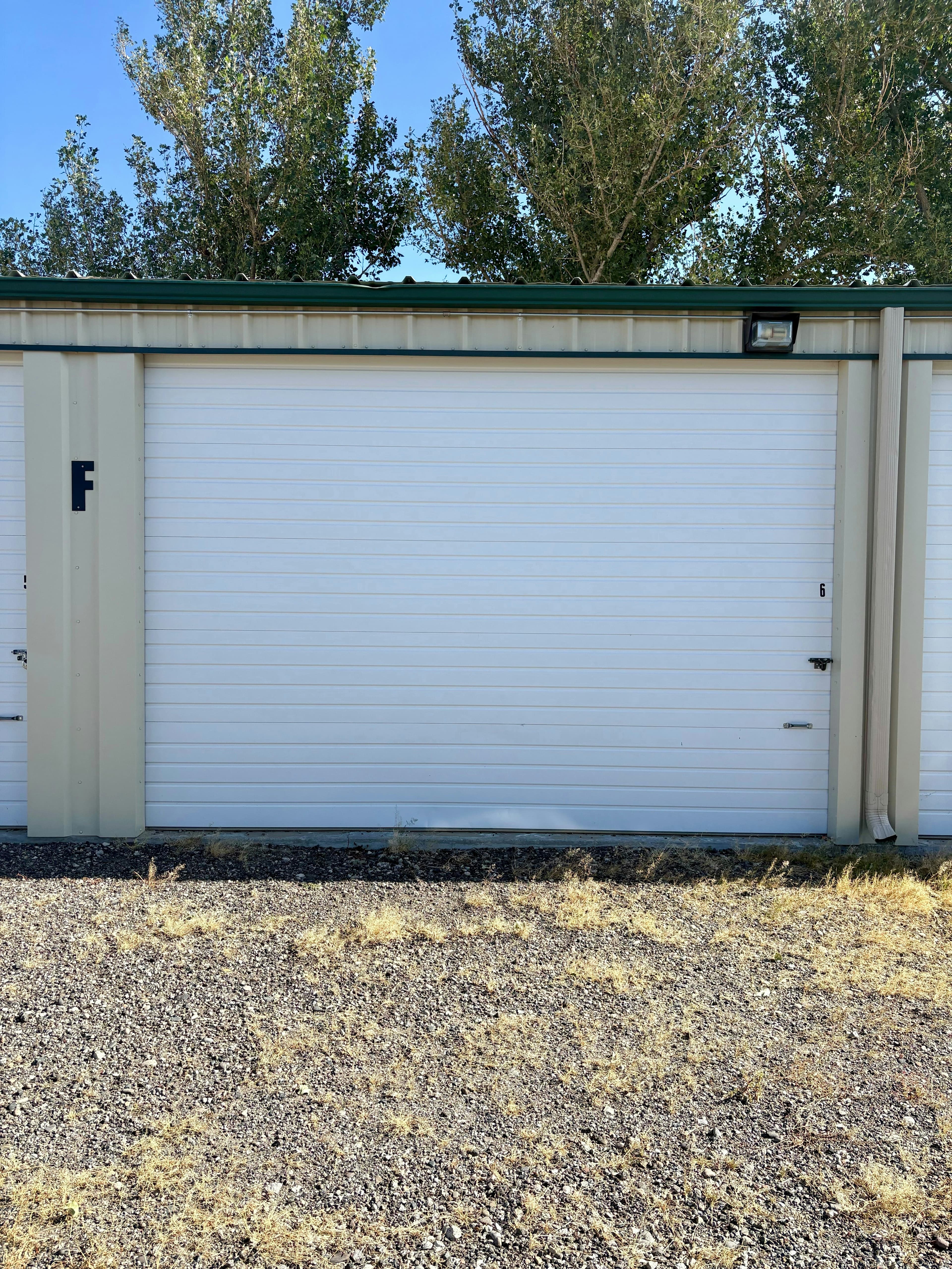 A white roll-up storage unit door